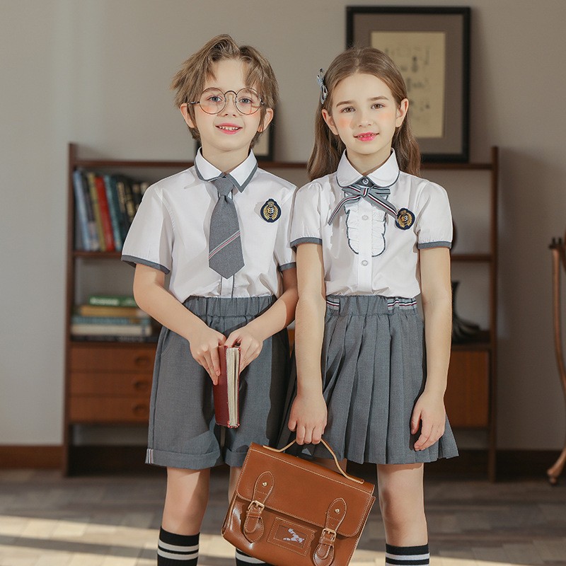 Uniformes escolares de carbón y blancos | Colección de grado K-8 | Recepción de pedidos personalizados