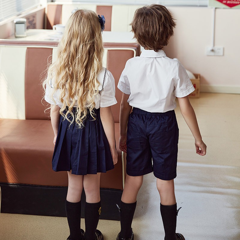 Custom White & Navy Uniforms | Elementary & Middle Grades | Factory Direct