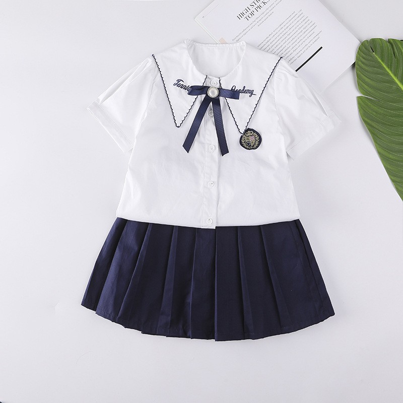 Custom White & Navy Uniforms | Elementary & Middle Grades | Factory Direct